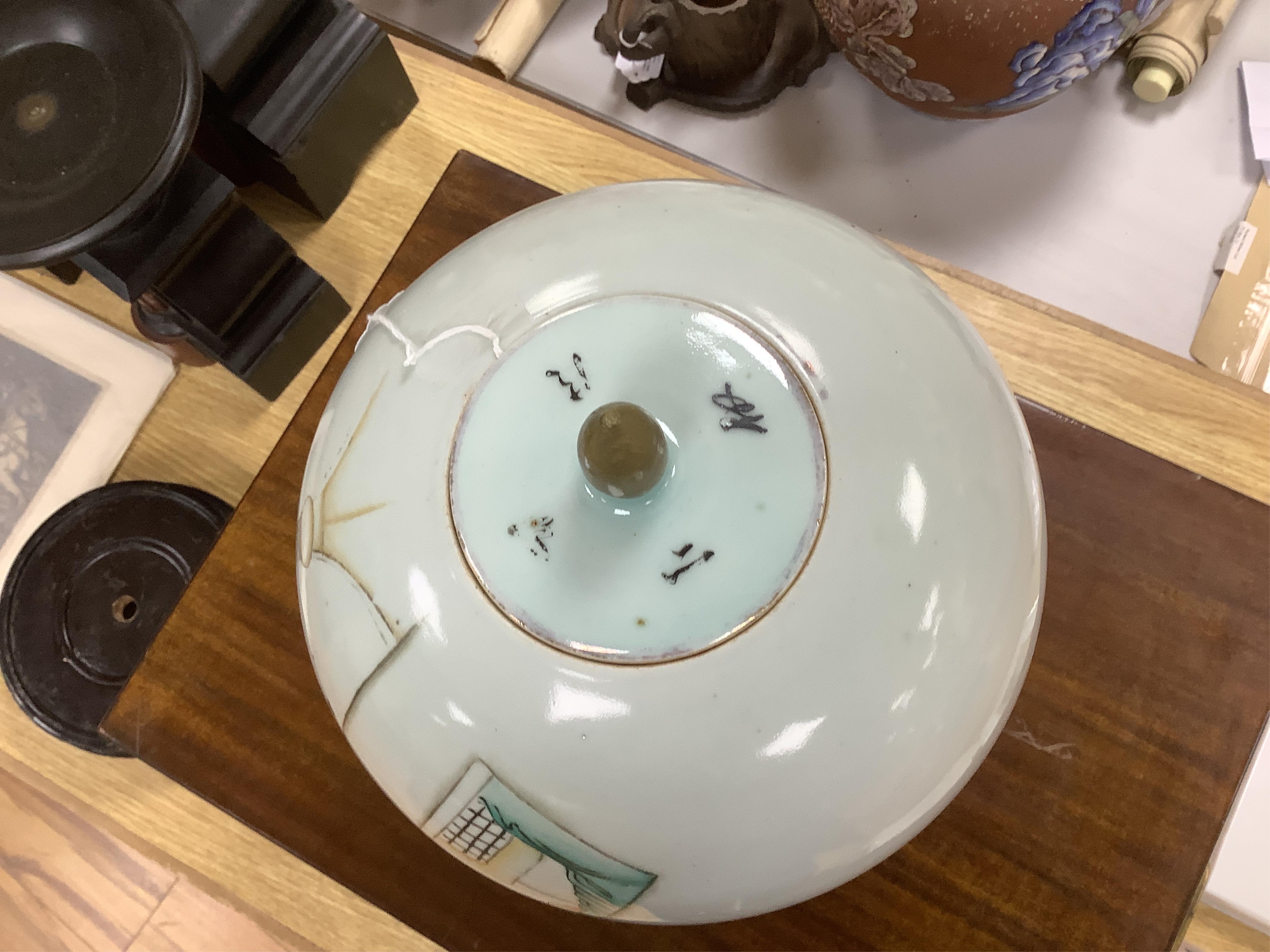 An early 20th century Chinese famille rose jar and cover on stand., 33cm high not including stand. Condition - good